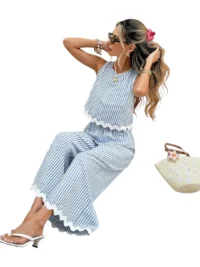 Blue striped wide-leg pants set with scalloped hem styled in a seated summer look.